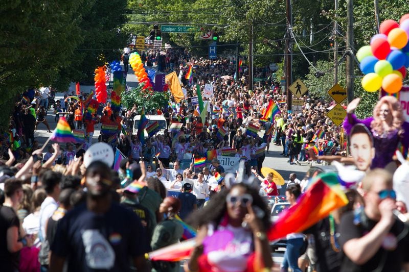A large crowd assembles on 10th Street  N.E. to watch the Atlanta Pride Parade Sunday in Atlanta October 14, 2018. STEVE SCHAEFER / SPECIAL TO THE AJC