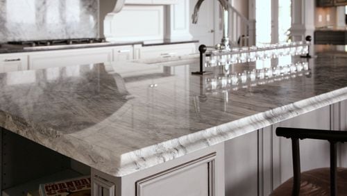 Oversized islands are one of the features of an upscale kitchen. CONTRIBUTED BY: Construction Resources.