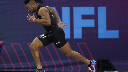 FILE - Texas running back Bijan Robinson runs the 40-yard dash at the NFL football scouting combine in Indianapolis, Sunday, March 5, 2023. Bijan Robinson ranks among the best overall prospects in the NFL draft. (AP Photo/Erin Hooley, File)