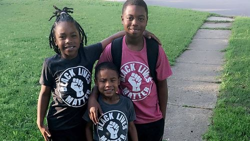 In an undated image provided by Jordan Herbert, from left, Bentlee Herbert, 8; Rodney Herbert, 5; and Jaelon Herbert, 12, wearing Black Lives Matter T-shirts. Two of the brothers were removed from their Oklahoma elementary school classrooms this past week and made to wait out the school day in a front office for wearing T-shirts that read “Black Lives Matter,” according to the boys’ mother.