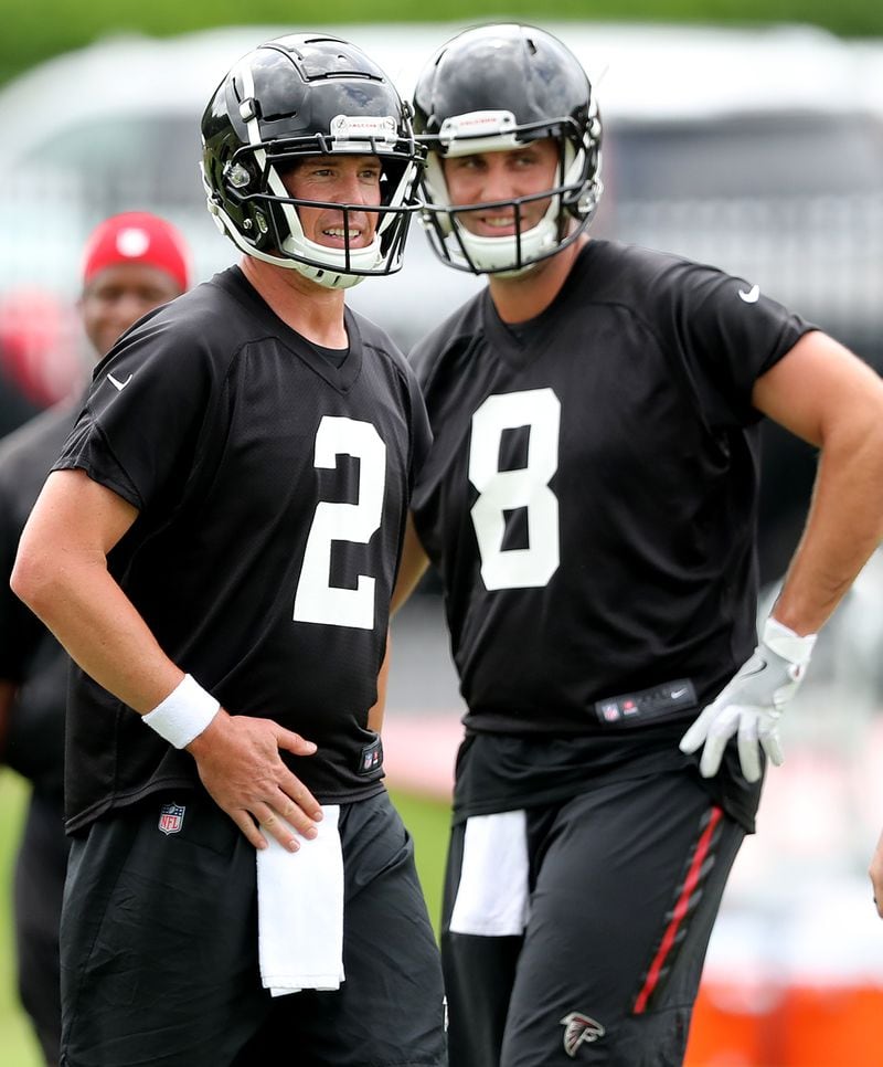 Falcons quarterback Matt Ryan and backup Matt Schaub get in some work during organized team activity on Wednesday, May 30, 2018, in Flowery Branch. (Curtis Compton/ccompton@ajc.com)
