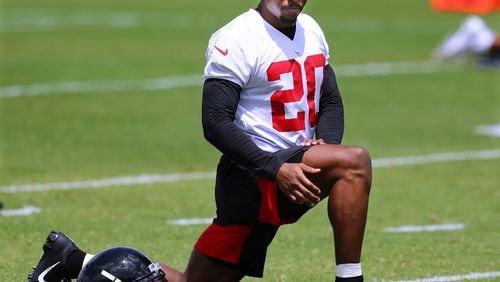 Falcons cornerback Kendall Sheffield loosens up for practice during rookie minicamp on Friday, May 10, 2019, in Flowery Branch.  Curtis Compton/ccompton@ajc.com