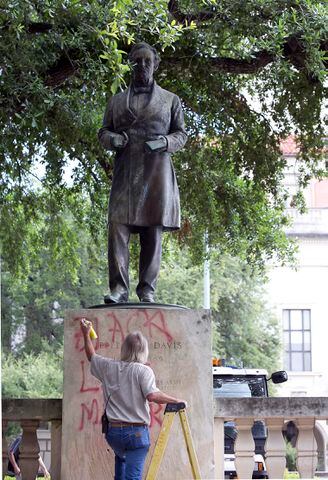 Graffiti painted on three Confederate statues at UT, 06.23.15