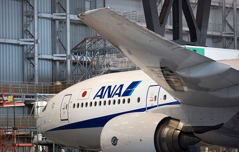 TOKYO, JAPAN - APRIL 01:  ANA Holdings Inc.'s Boeing Co. 777 aircraft is seen during the welcome ceremony held for the company's newly hired employees at a hanger on April 1, 2017 in Tokyo, Japan. Japanese airlines ANA Holdings welcomed 2,800 new employees, the largest number to date for the company. As the majority of Japanese start their career on April 1st after graduating from schools in February or March, it is a custom for large Japanese corporations to hold mass welcoming ceremonies for their new employees.  (Photo by Tomohiro Ohsumi/Getty Images)