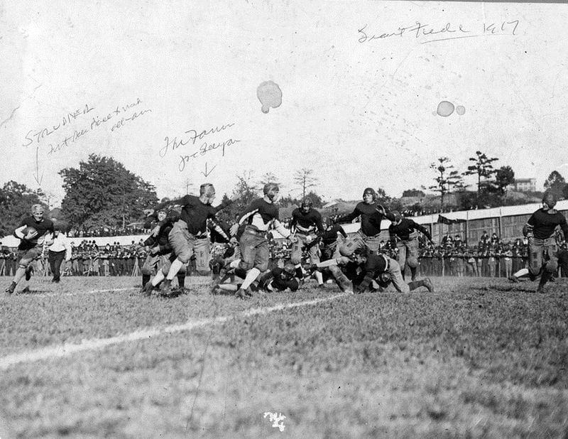 An action photo from Georgia Tech's 41-0 win over Pennsylvania on October 6, 1917 at Grant Field. Halfback Everett Strupper is identified on the left, as is halfback Joe Guyon. (Georgia Tech Archives)
