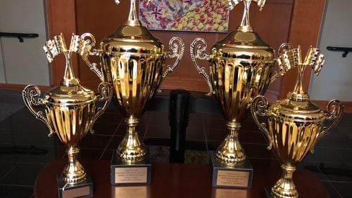 Four trophies will be awarded to schools competing in the first-ever diversepower Grand Prix race at LaGrange College. High school and middle school teams race electric cars that they've built themselves. ARLINDA SMITH BROADY/AJC