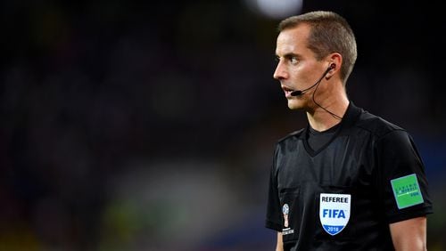 Referee Mark Geiger works the 2018 FIFA World Cup Russia Round of 16 match between Colombia and England July 3, 2018, at Spartak Stadium in Moscow.