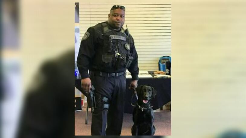 Rockdale County Deputy Eric Tolbert was removed from the K-9 unit in August after an animal cruelty investigation, the sheriff's office said.
