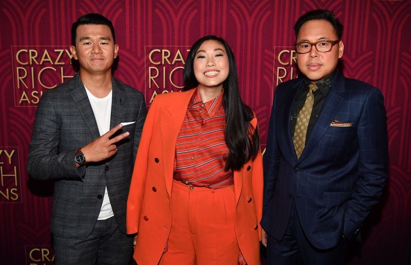 ATLANTA, GA - AUGUST 02:  Ronny Chieng, Awkwafina, and Nico Santos attend the "Crazy Rich Asians" Atlanta Red Carpet Screening at Regal Atlantic Station on August 2, 2018 in Atlanta, Georgia.  (Photo by Paras Griffin/Getty Images for Warner Bros.)