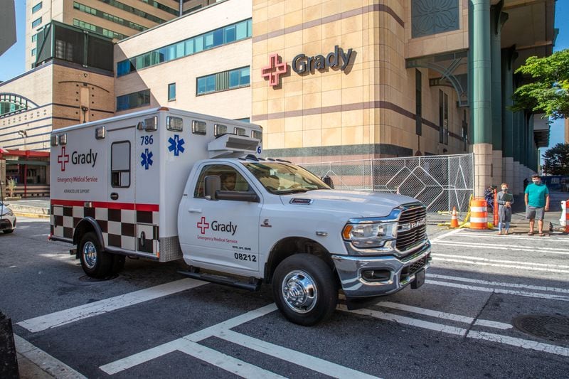 An ambulance leaves Grady Memorial Hospital in Atlanta. Paramedics, EMTs and nurses are part of the response teams at Grady EMS. (Steve Schaefer / steve.schaefer@ajc.com)
