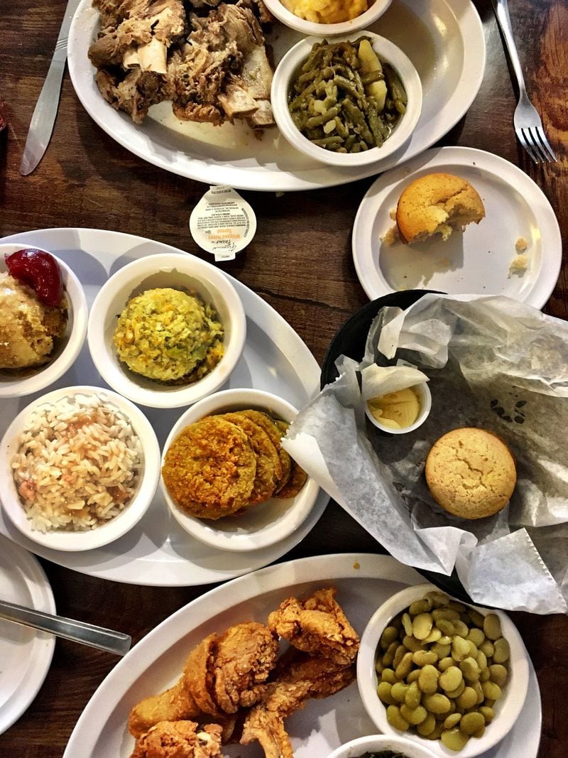 The best way to order at Busy Bee Café is to fill your tables up with sides, including cornbread dressing, mac and cheese, and lima beans. CONTRIBUTED BY WYATT WILLIAMS