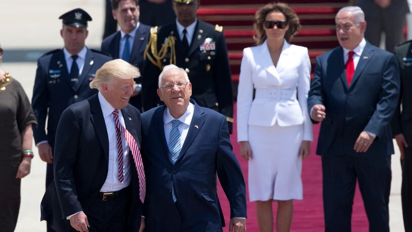 US President Donald Trump and Israeli President Reuven Rivlin walk during welcome ceremony in Tel Aviv, Monday, May 22,2017. (AP Photo/Oded Balilty)