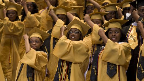 A former principal of Atlanta's Douglass High school says the district is not giving the struggling school the help it needs. This is a photo of the 2012 graduation ceremony at the school. (APS Photo)