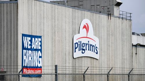 This April 28, 2020 file photo shows the Pilgrim’s Pride plant in Cold Spring. Minn. A federal grand jury has charged four current and former chicken company executives with price-fixing. (Dave Schwarz/St. Cloud Times via AP)