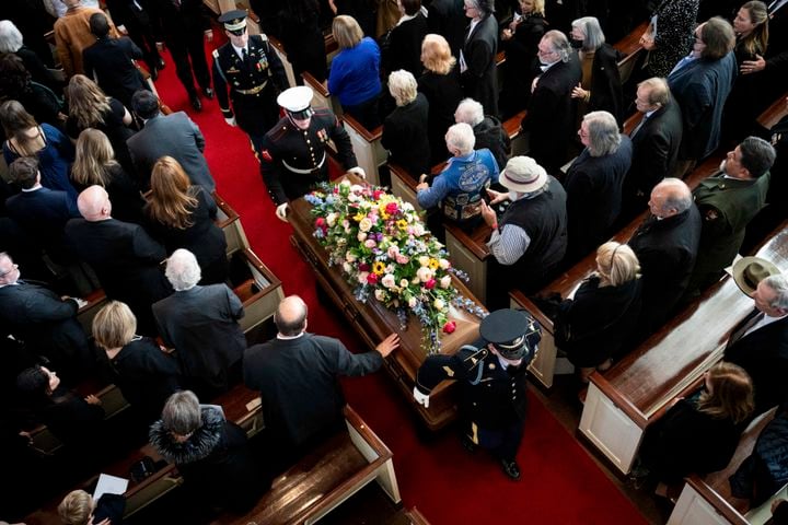 The coffin of former first lady Rosalynn Carter is escorted from her memorial service at Glenn Memorial Church in Atlanta, Nov. 28, 2023. (Erin Schaff/The New York Times)