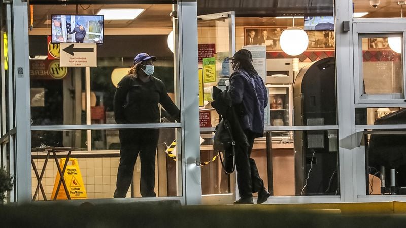 Gunfire was reported in the parking lot of the Waffle House on Flat Shoals Parkway near Wesley Chapel Road at about 10:30 p.m. Wednesday, according to DeKalb police.