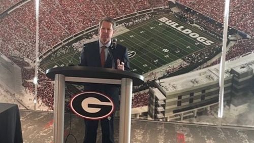 Georgia Gov. Brian Kemp, shown in a May 2021 appearance in the Georgia Bulldogs' recruiting lounge at Sanford Stadium, has declared Monday, Jan. 10, 2022, as Hunker Down Day as the Georgia Bulldogs vie for the college football national championship. (AJC file photo/Greg Bluestein)