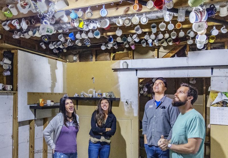 Team #1 Christina and Colin Beck show hosts Ken and Anita Corsini the coffee mug room located in the basement of their round #2 house, as seen on "Flipping Showdown." HGTV