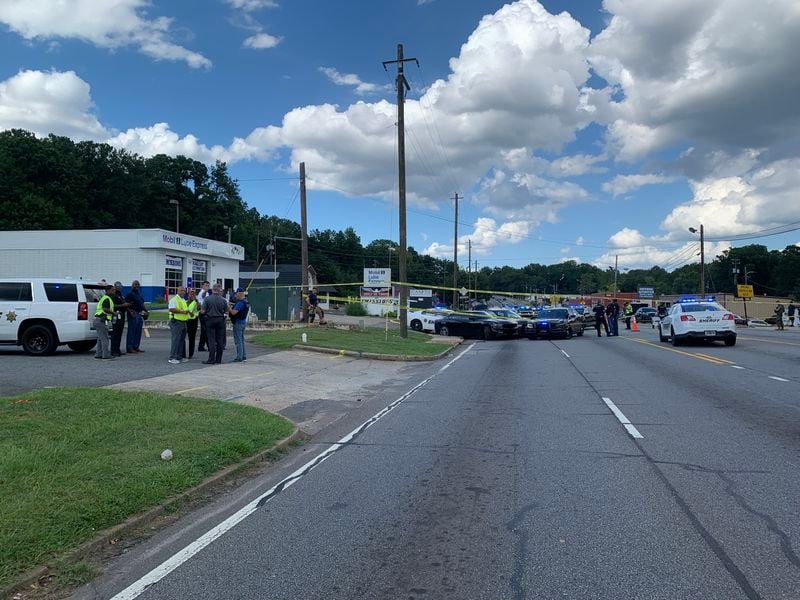 The deadly police shooting shut down Powder Springs Road for several hours.