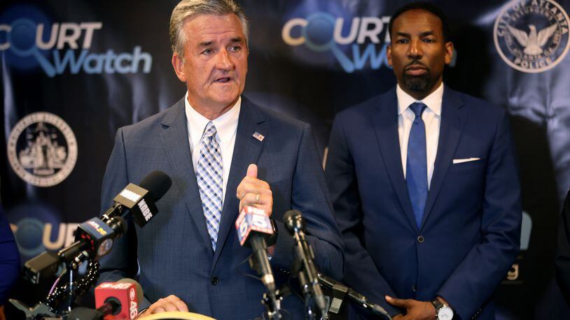 Atlanta Police Foundation President and CEO Dave Wilkinson speaks at a press conference at the Fulton County courthouse Monday, June 13, 2022, in Atlanta. Also pictured is Atlanta Mayor Andre Dickens, right. (Jason Getz / Jason.Getz@ajc.com)