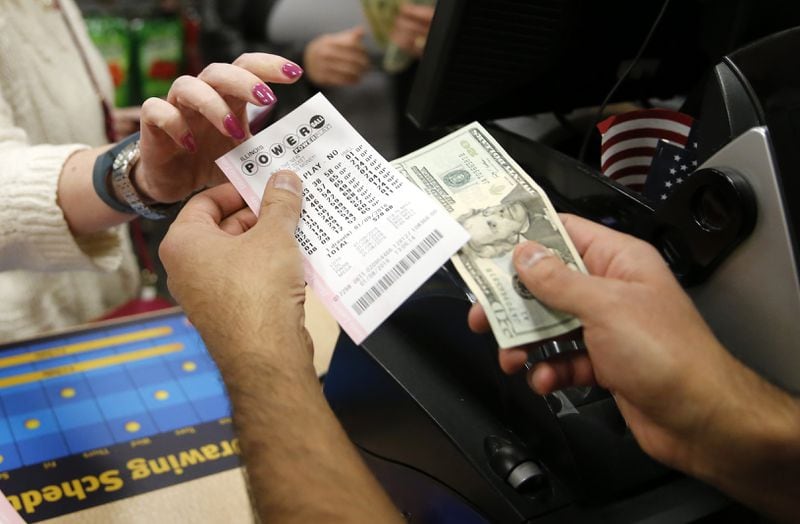 Wednesday’s Powerball jackpot rose from $440 million to $460 million due to strong sales. (Credit: AP Photo/Charles Rex Arbogast)