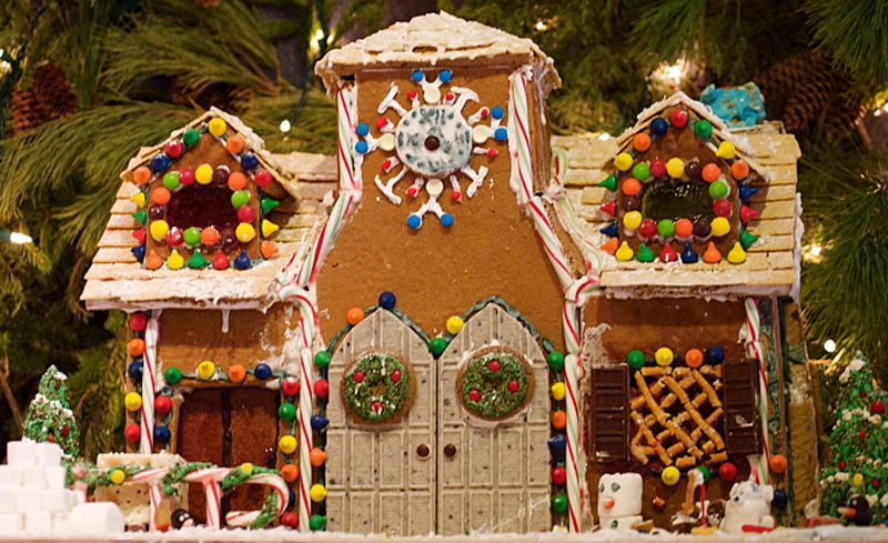 A modern deluxe gingerbread house complete with double doors. Ginger traces back to the early traditions of winter solstice.