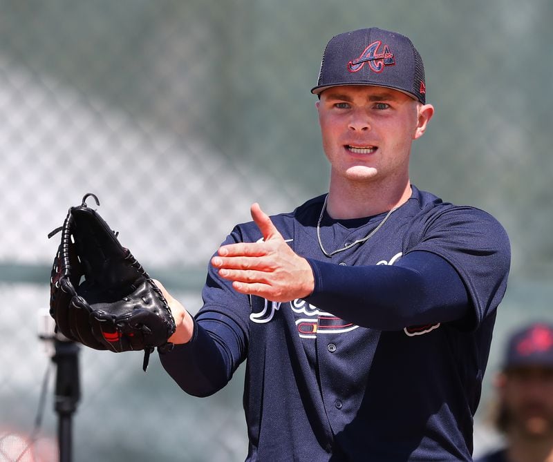031422 North Port: Atlanta Braves pitcher Sean Newcomb reacts after a pitch from the practice mounds during team practice at Spring Training on Monday, March 14, 2022, in North Port.   “Curtis Compton / Curtis.Compton@ajc.com”`