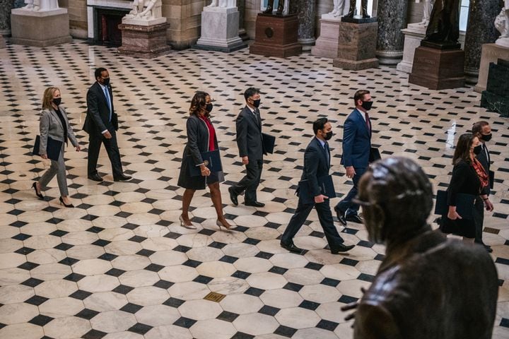 The House impeachment managers walk to the Senate chambers of the Capitol in Washington on Tuesday, Feb. 9, 2021, for the second impeachment trial of former President Donald Trump. (Brandon Bell/The New York Times)