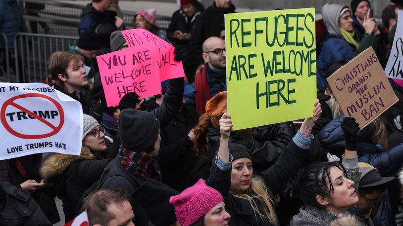 NEW YORK, NY - JANUARY 28: Protestors rally during a demonstration against the Muslim immigration ban at John F. Kennedy International Airport on January 28, 2017 in New York City. President Trump signed the controversial executive order that halted refugees and residents from predominantly Muslim countries from entering the United States. (Photo by Stephanie Keith/Getty Images)