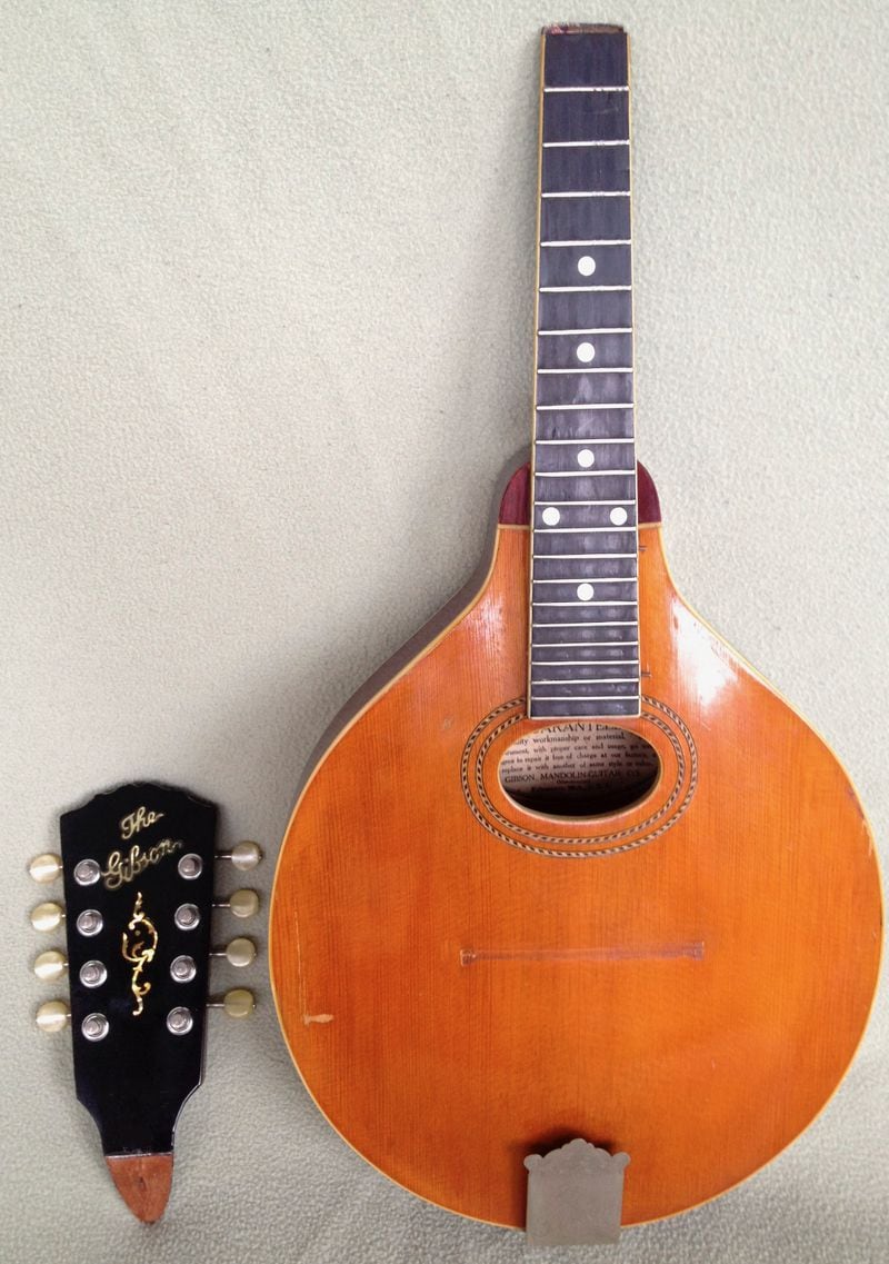 A 1915 Gibson mandolin with a critical injury has been put back together three times. Was it worth it? Photo: Jack Brantley