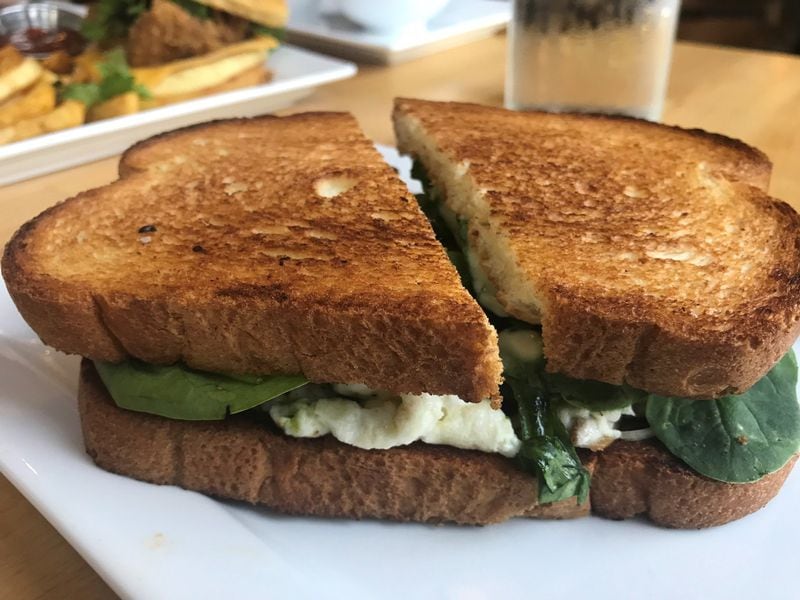 The Blackbird Sandwich, featuring egg white, brie, spinach, pesto, enoki mushrooms and bacon, is an item on the breakfast menu at the restaurant located in downtown Atlanta’s Centennial Park district. LIGAYA FIGUERAS/LFIGUERAS@AJC.COM