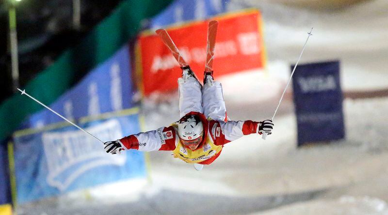 FILE - First-place finisher Mikael Kingsbury, of Canada, competes in the men's dual moguls at the World Cup freestyle skiing competition at Deer Valley resort Saturday, Feb. 4, 2017, in Park City, Utah. Salt Lake City's enduring enthusiasm for hosting the Olympics will be on full display Wednesday, April 10, 2024, when members of the International Olympic Committee come to Utah for a site visit ahead of a formal announcement expected this July to name Salt Lake City the host for the 2034 Winter Olympics. (AP Photo/Rick Bowmer, File)
