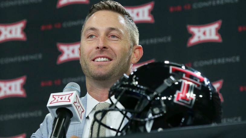 Texas Tech head football coach Cliff Kingsbury listens to a reporter's question during the Big 12 NCAA college football media day in Frisco, Texas, Monday, July 17, 2017. (AP Photo/LM Otero)