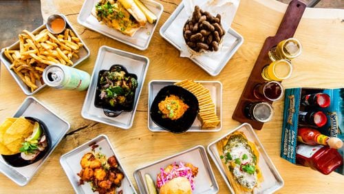 SweetWater’s renovated taproom, which opened in April, is an example of dining playing a bigger role in metro Atlanta’s growing beer scene. CONTRIBUTED BY HENRI HOLLIS