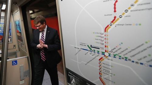MARTA General Manager/CEO Jeffrey Parker boards a train at the Five Points station next to a map of the rail lines and stops during a behind the scenes tour on Thursday, March 7, 2019, in Atlanta. Curtis Compton/ccompton@ajc.com