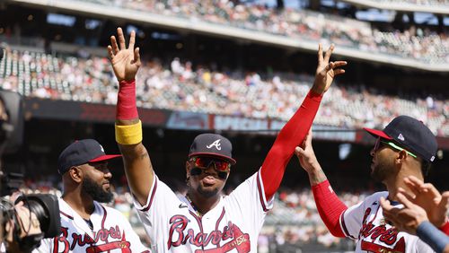 Braves right fielder Ronald Acuna Jr. (13) waves to the fans as the team is being recognized moments before the last game of the season against the Washington Nationals at Truist Park at Truist Park on Sunday, October 1, 2023, in Atlanta. Miguel Martinez / miguel.martinezjimenez@ajc.com