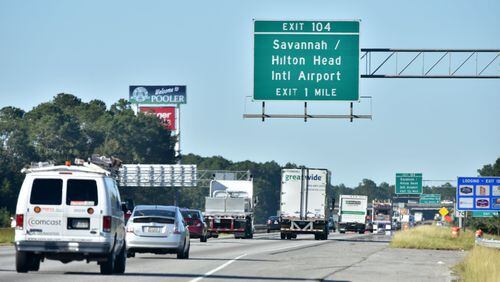 Traffic on I-95 moves toward Savannah after Gov. Nathan Deal lifted mandatory evacuation orders Sunday afternoon, allowing thousands displaced by Hurricane Mathew to return home. HYOSUB SHIN / HSHIN@AJC.COM