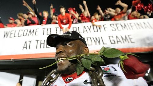 Georgia defender John Atkins celebrates beating Oklahoma 54-48 during double over time in the College Football Playoff Semifinal at the Rose Bowl Game on Monday, January 1, 2018, in Pasadena, Calif.