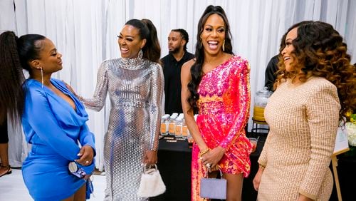 THE REAL HOUSEWIVES OF ATLANTA -- Pictured: (l-r) Kandi Burruss, Kenya Moore, Sanya Richards Ross and Drew Sidora -- (Photo by: Darnel Williams/Bravo)