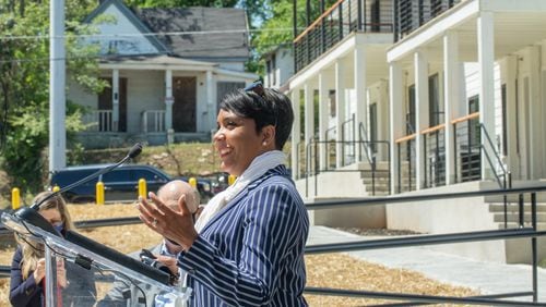 Mayor Keisha Lance Bottoms addresses the crowd at the ribbon-cutting ceremony for the new complex in English Avenue. (Jenni Girtman for The Atlanta Journal-Constitution)