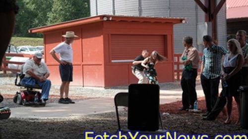 Brian Pritchchard with FetchYourNews.com captured this image of citizen-journalist Nydia Tisdale being arrested by a Dawson County sheriff’s captain for filming a political rally in August 2014. Tisdale is now standing trial for felony obstruction of an officer and two misdemeanors in Dawson County.
