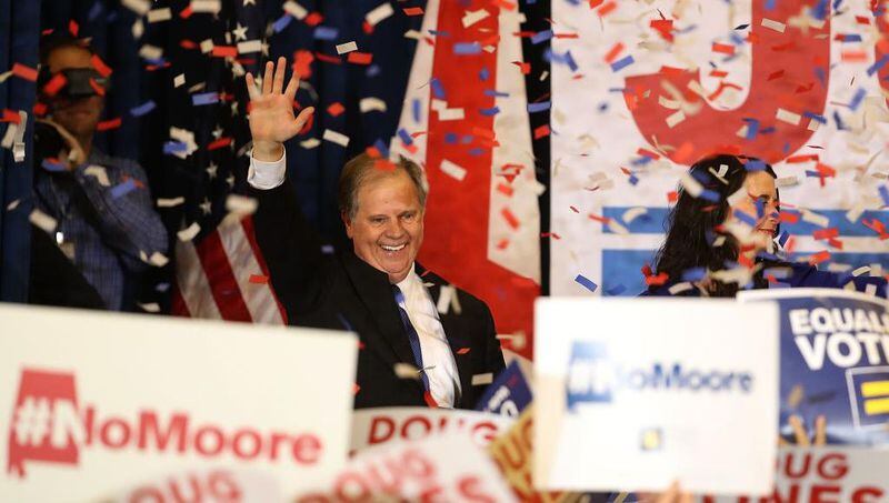 Democratic U.S. Senator-elect Doug Jones greets supporters during his election night victory celebration at the Sheraton Hotel on December 12, 2017 in Birmingham, Alabama. Jones defeated Republican challenger Roy Moore to claim Alabama's  vacant U.S. Senate seat. 