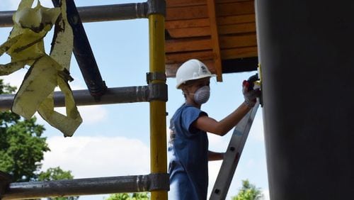 Natalie Smith, a volunteer and freshman at the University of South Carolina at the time, works on a Habitat for Humanity project in 2019 in Redzynskie, a small Polish village of about 1,400 people. CONTRIBUTED BY MOLLY SMITH