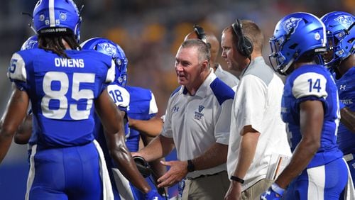 Georgia State head coach Shawn Elliott instructs Georgia State wide receiver Penny Hart (18)  in the first half of the Panthers’ season opening game against Kennesaw State Aug. 30, 2018, at Georgia State Stadiumin Atlanta.