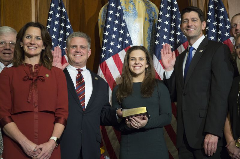 House Speaker Paul Ryan of Wis. administers the House oath of office to Rep. Drew Ferguson, R-Ga., during a mock swearing in ceremony on Capitol Hill on Jan. 3, 2017. (AP Photo/Zach Gibson)
