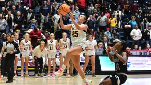 March 9, 2022 Macon - Marist's Avery Fantucci (25) scores the game winning two point basket in double overtime during the 2022 GHSA State Basketball Championship game at the Macon Centreplex in Macon on Wednesday, March 9, 2022. Marist won 56-54 over Luella in overtime. (Hyosub Shin / Hyosub.Shin@ajc.com)