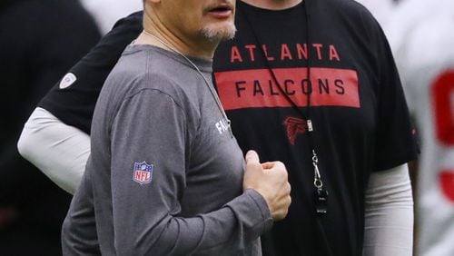 Falcons general manager Thomas Dimitroff and head coach Dan Quinn watch over the second day of rookie minicamp on Saturday, May 11, 2019, in Flowery Branch.  Curtis Compton/ccompton@ajc.com