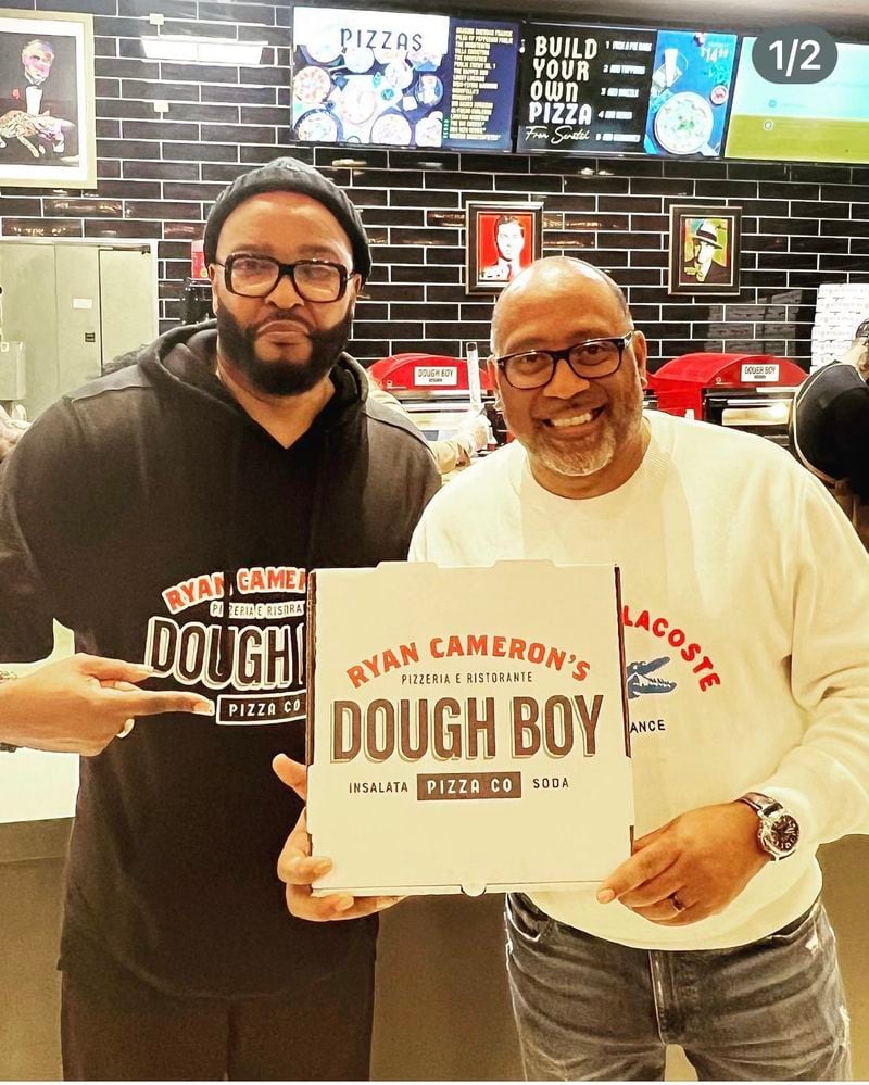 Frank Ski showed up to support his former radio colleague Ryan Cameron at Cameron's opening of his new pizza place Dough Boy Pizza at South DeKalb Mall in 2023. CONTRIBUTED