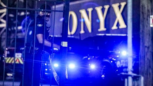 File photo: Atlanta police investigate a July 2023 shooting at Onyx Gentlemen's Club on Cheshire Bridge Road. Thieves stole about $250,000 from the popular strip club early Monday after breaking in through the roof, authorities said. (John Spink / John.Spink@ajc.com)