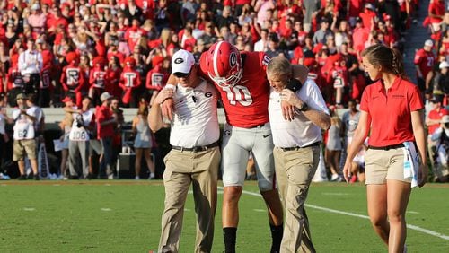September 2, 2017 Athens: Georgia fans stand in silence as quarterback Jacob Eason leaves the game with an injury during the first quarter against Appalachian State in a NCAA college football game on Saturday, September 2, 2017, in Athens. Curtis Compton/ccompton@ajc.com